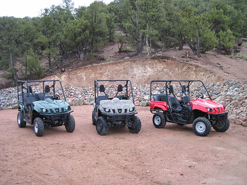 3 ATVs on the desert